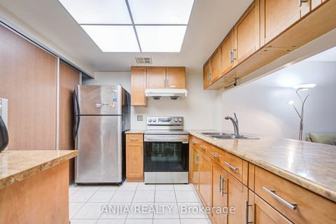 Photo 10 at 512 - 225 Bamburgh Circle, Steeles, Toronto