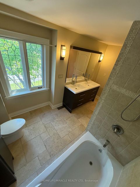 Photo 16 at 16 Ravenscrest Drive, Rosethorn, Toronto