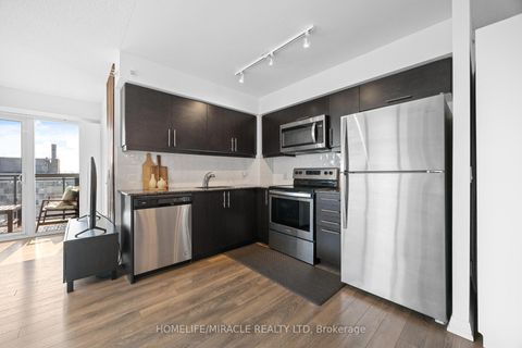 Photo 7 at 2002 - 30 Meadowglen Place, Woburn, Toronto