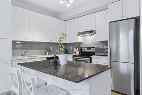Photo 10 at 27 - 200 Alex Gardner Circle, Aurora Village, Aurora
