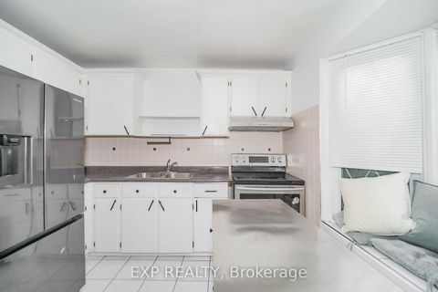 Photo 8 at 55 Hollyberry Trail, Hillcrest Village, Toronto