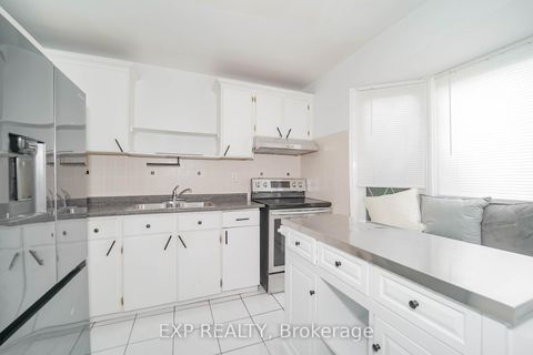 Photo 9 at 55 Hollyberry Trail, Hillcrest Village, Toronto
