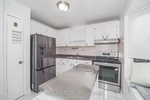 Photo 11 at 55 Hollyberry Trail, Hillcrest Village, Toronto