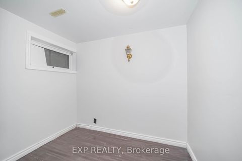Photo 30 at 55 Hollyberry Trail, Hillcrest Village, Toronto