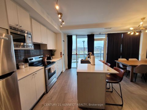 Photo 1 at TH2 - 60 George Butchart Drive, CFB, Toronto
