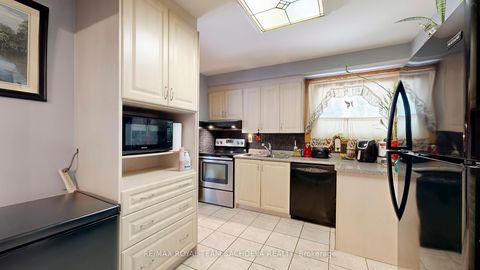 Photo 11 at 765 Morrish Road, Highland Creek, Toronto