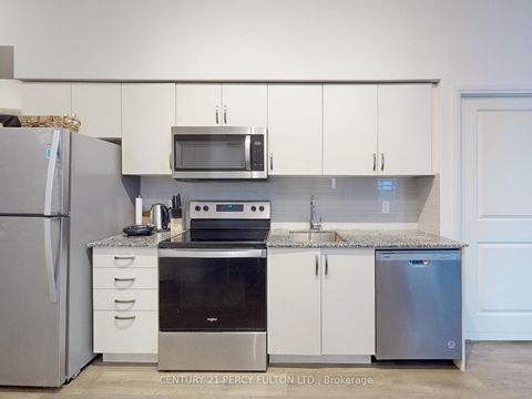 Photo 9 at LPH 01 - 10 Meadowglen Place, Woburn, Toronto