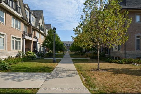 Photo 1 at 20 - 1 Eaton Park Lane, L'Amoreaux, Toronto