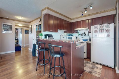 Photo 2 at 2311 - 36 LEE CENTRE Drive, Woburn, Toronto