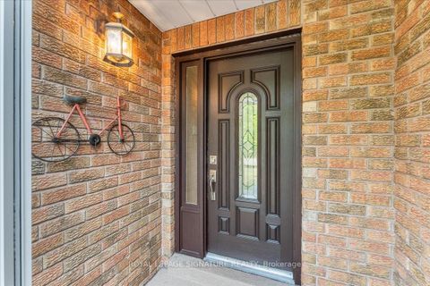 Photo 2 at 57 Tribbling Crescent, Hills of St Andrew, Aurora