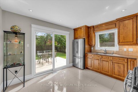 Photo 13 at 57 Tribbling Crescent, Hills of St Andrew, Aurora