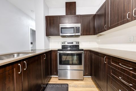 Photo 11 at 107 - 3560 St Clair Avenue E, Kennedy Park, Toronto
