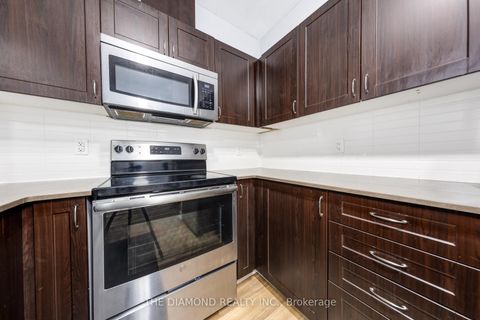 Photo 12 at 107 - 3560 St Clair Avenue E, Kennedy Park, Toronto