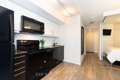 Photo 4 at 707 - 30 Meadowglen Place, Woburn, Toronto