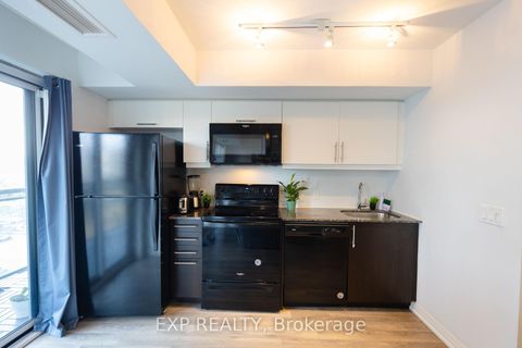 Photo 9 at 707 - 30 Meadowglen Place, Woburn, Toronto