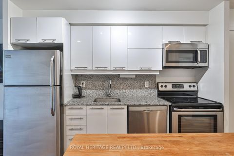 Photo 8 at 104 - 38 Joe Shuster Way, South Parkdale, Toronto