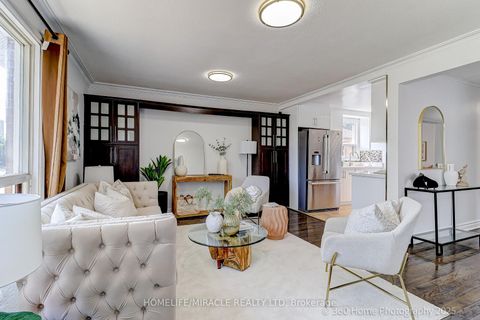 Photo 2 at 34 Merrian Road, Kennedy Park, Toronto