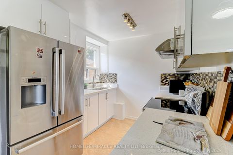 Photo 3 at 34 Merrian Road, Kennedy Park, Toronto