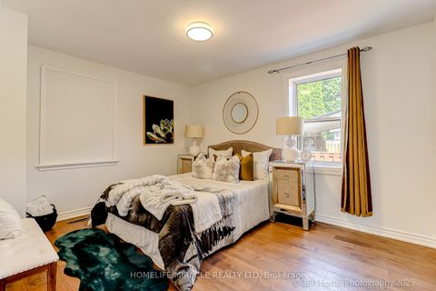 Photo 7 at 34 Merrian Road, Kennedy Park, Toronto