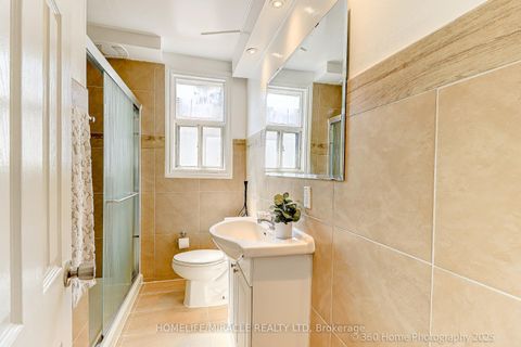 Photo 9 at 34 Merrian Road, Kennedy Park, Toronto