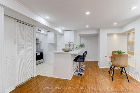 Photo 12 at 34 Merrian Road, Kennedy Park, Toronto