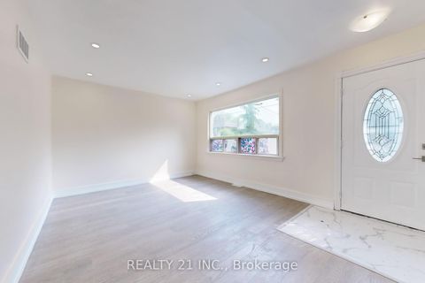 Photo 3 at 98 Natal Avenue, Cliffside, Toronto