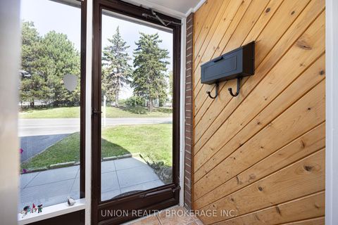 Photo 1 at 1 - 50 Vicora Link Way, Flemingdon Park, Toronto