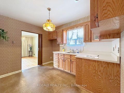 Photo 7 at 19 Kidbrooke Crescent, Cliffcrest, Toronto