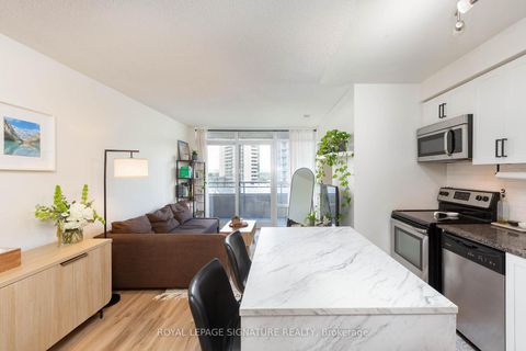 Photo 1 at 1323 - 38 Joe Shuster Way, South Parkdale, Toronto
