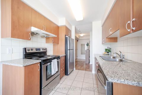 Photo 10 at 2003 - 88 Grangeway Avenue, Woburn, Toronto