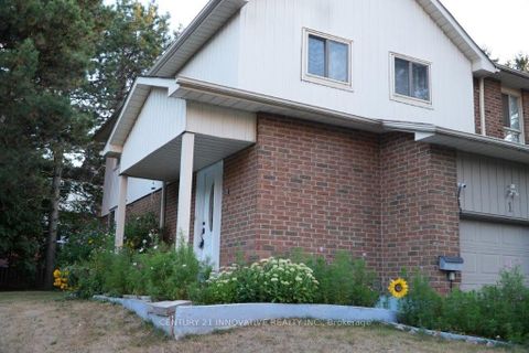 Photo 1 at 1 - 34 Dundalk Drive, Dorset Park, Toronto