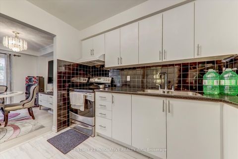 Photo 12 at 1 - 34 Dundalk Drive, Dorset Park, Toronto