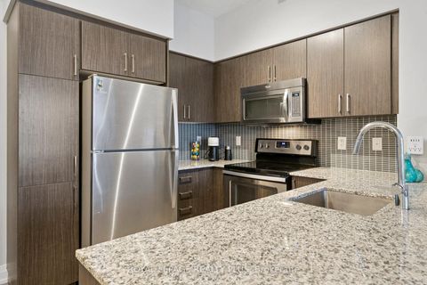 Photo 3 at 406 - 65 Speers Road, QE Queen Elizabeth, Oakville