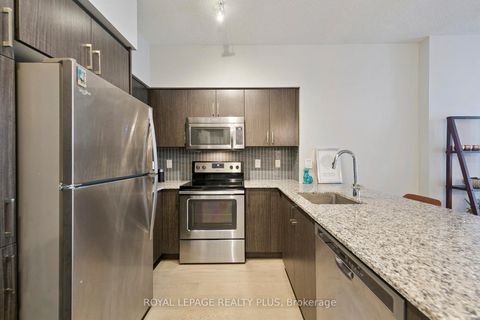 Photo 4 at 406 - 65 Speers Road, QE Queen Elizabeth, Oakville