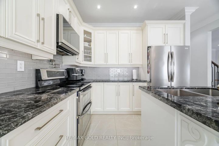 Photo 11 at 10 Cloverlawn Street, Fletcher's Meadow, Brampton