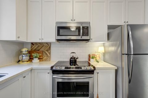 Photo 8 at 68 Raffeix Lane, Regent Park, Toronto