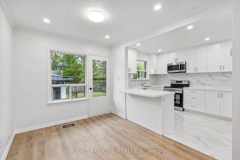 Photo 2 at 53 Lawnside Drive, Rustic, Toronto