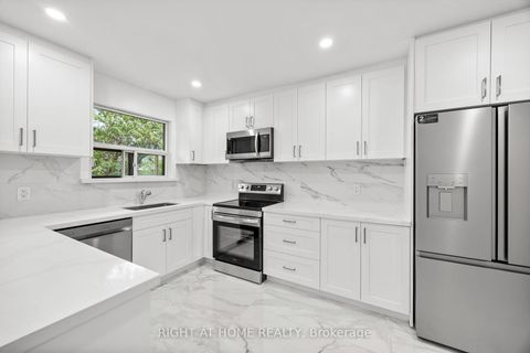 Photo 8 at 53 Lawnside Drive, Rustic, Toronto