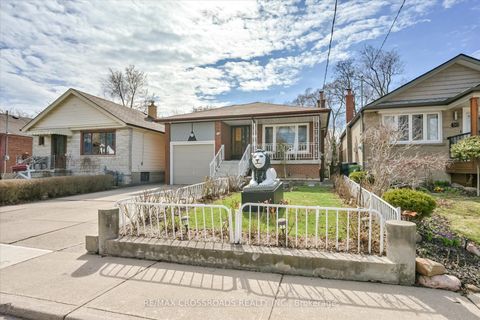 Photo 1 at 48 Phillip Avenue, Cliffside, Toronto