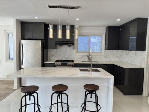 Photo 1 at 104 Loganberry Crescent, Hillcrest Village, Toronto