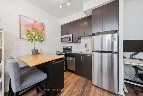 Photo 11 at 1117 - 15 James Finlay Way, CFB, Toronto