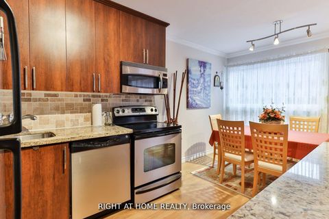Photo 2 at 12 - 50 Three Valleys Drive, Donalda, Toronto