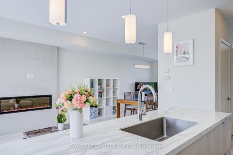 Photo 4 at 27 Sonic Way, Flemingdon Park, Toronto