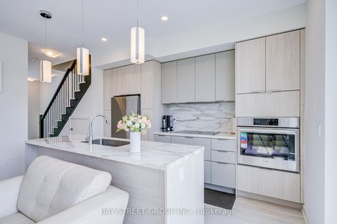 Photo 8 at 27 Sonic Way, Flemingdon Park, Toronto