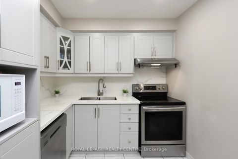 Photo 2 at 11 - 444 Silverstone Drive, Clairville, Toronto