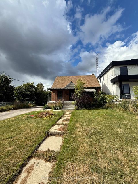 Photo 1 at 90 Glen Long Avenue, Glen Park, Toronto