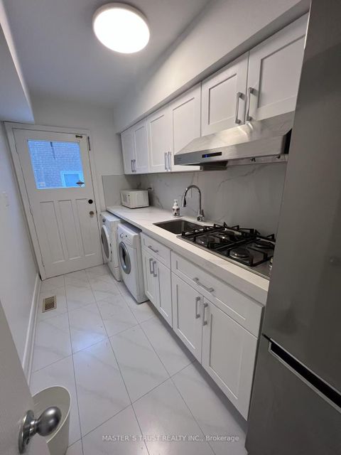 Photo 29 at 31 Wyvern Road, Steeles, Toronto