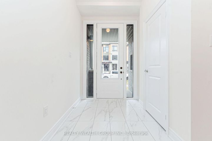 Photo 3 at 221 Tennant Circle, Vellore Village, Vaughan