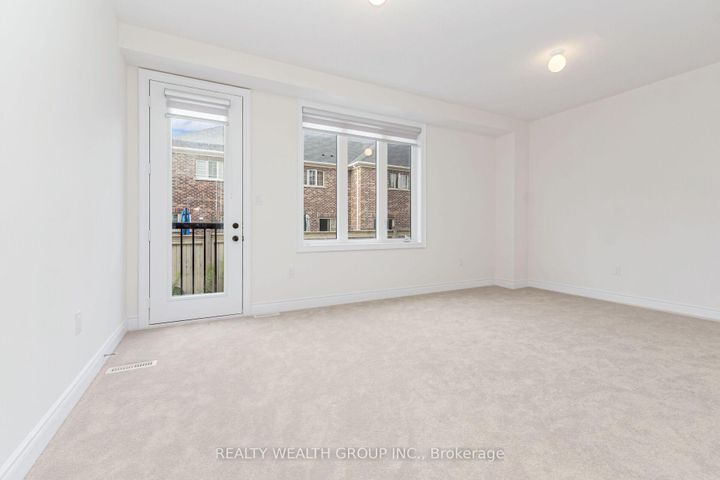 Photo 6 at 221 Tennant Circle, Vellore Village, Vaughan