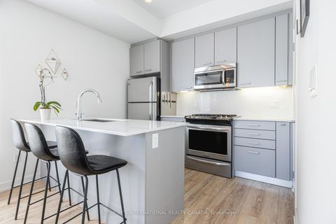 Photo 1 at 4 - 1331 Gerrard Street, Coxwell, Toronto